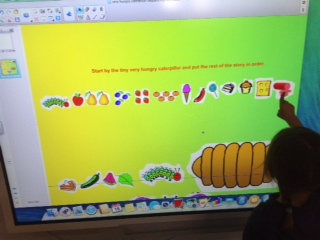 Child uses smart board
